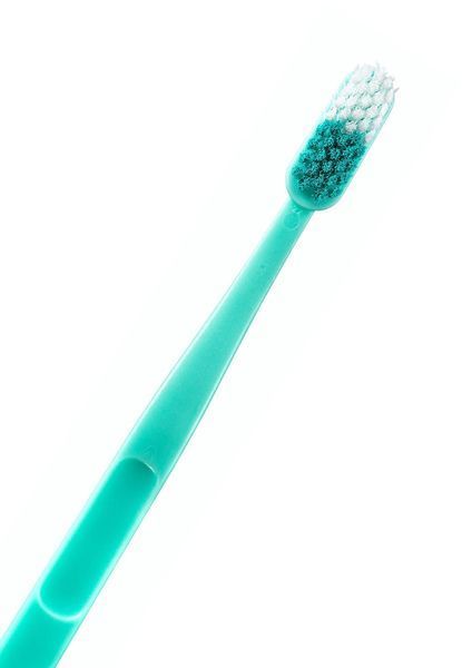 Зубная щетка Jordan Clean Smile, средней жесткости бирюзового цвета 56106010-T фото